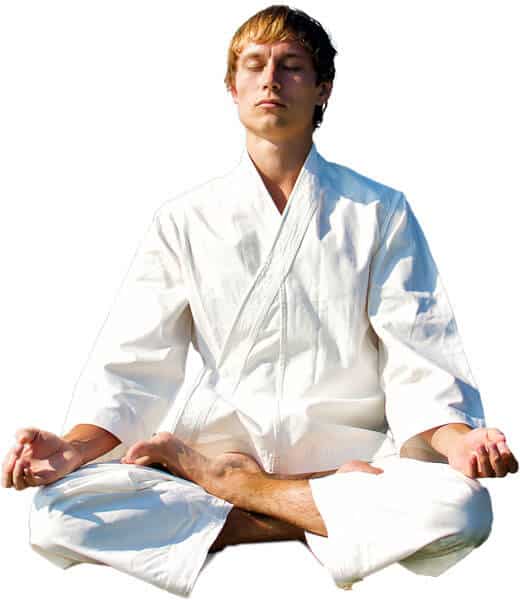 Martial Arts Lessons for Adults in Flushing NY - Young Man Thinking and Meditating in White