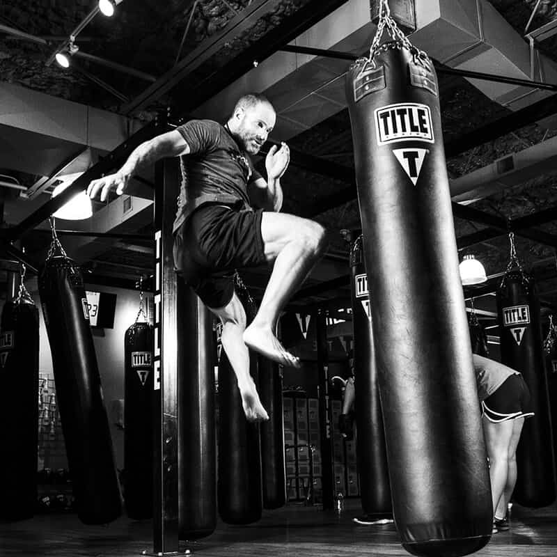 Mixed Martial Arts Lessons for Adults in Flushing NY - Flying Knee Black and White MMA